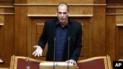 Greek Finance Minister Yanis Varoufakis speaks during a Parliament session in Athens, Feb. 9, 2015. 