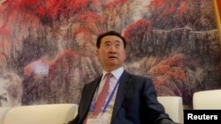 中国首富、万达集团董事长王健林2013年9月在青岛。