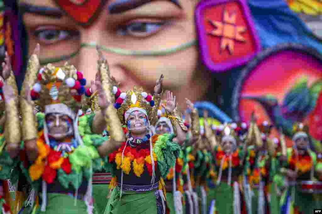 Artists perform during the Blacks and Whites Carnival in Pasto, Colombia, January 6, 2021.