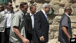 Israeli Prime Minister Benjamin Netanyahu, second from right, arrives at a special cabinet meeting marking upcoming Jerusalem Day at the Tower of David Museum, near Jaffa Gate in Jerusalem's Old City, May 29, 2011