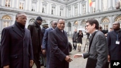 FILE - Congo President Denis Sassou Nguesso, center, arrives for a conference on Ebola at the Egmont Palace in Brussels, March 3, 2015.