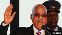 South African President Jacob Zuma takes his oath of office during his inauguration ceremony at the Union Buildings in Pretoria May 24, 2014.