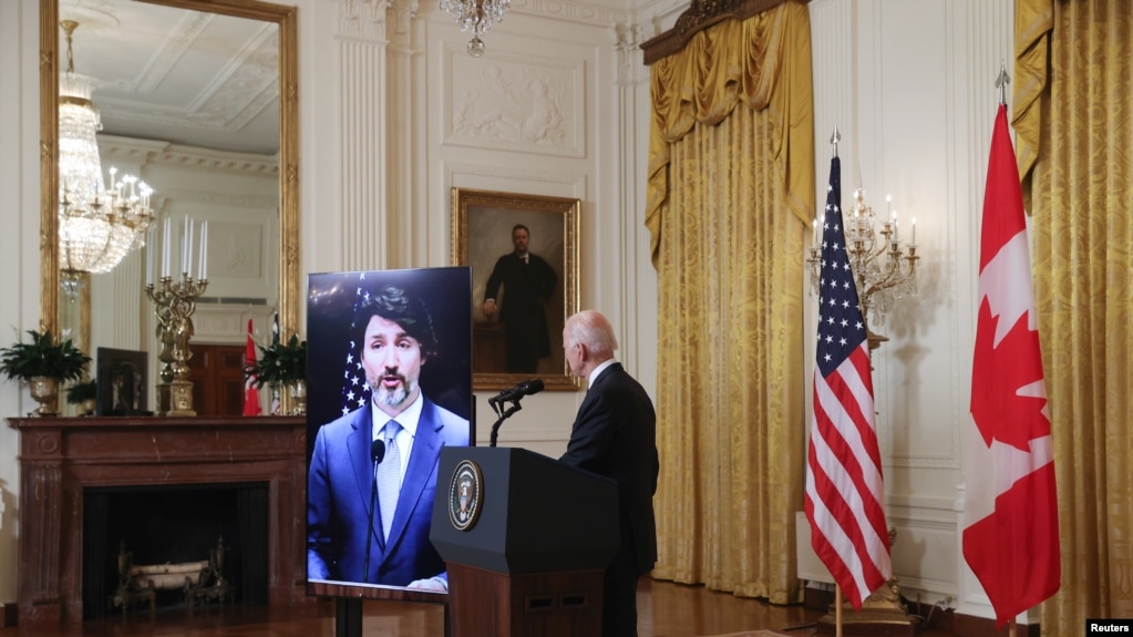 美国总统拜登与加拿大总理特鲁多2021年2月23日通过视频举行双边会谈（路透社）(photo:VOA)