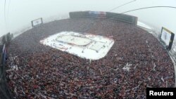 FILE - A general view from the roof of Michigan Stadium during the 2014 Winter Classic hockey game between the Detroit Red Wings and the Toronto Maple Leafs, Ann Arbor, Michigan, Jan. 1, 2014.