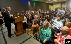 FILE - Republican gubernatorial candidate Ed Gillespie delivers a victory speech June 13, 2017, in Richmond, Va. Gillespie beat state Sen. Frank Wagner and Corey Stewart in a primary election.