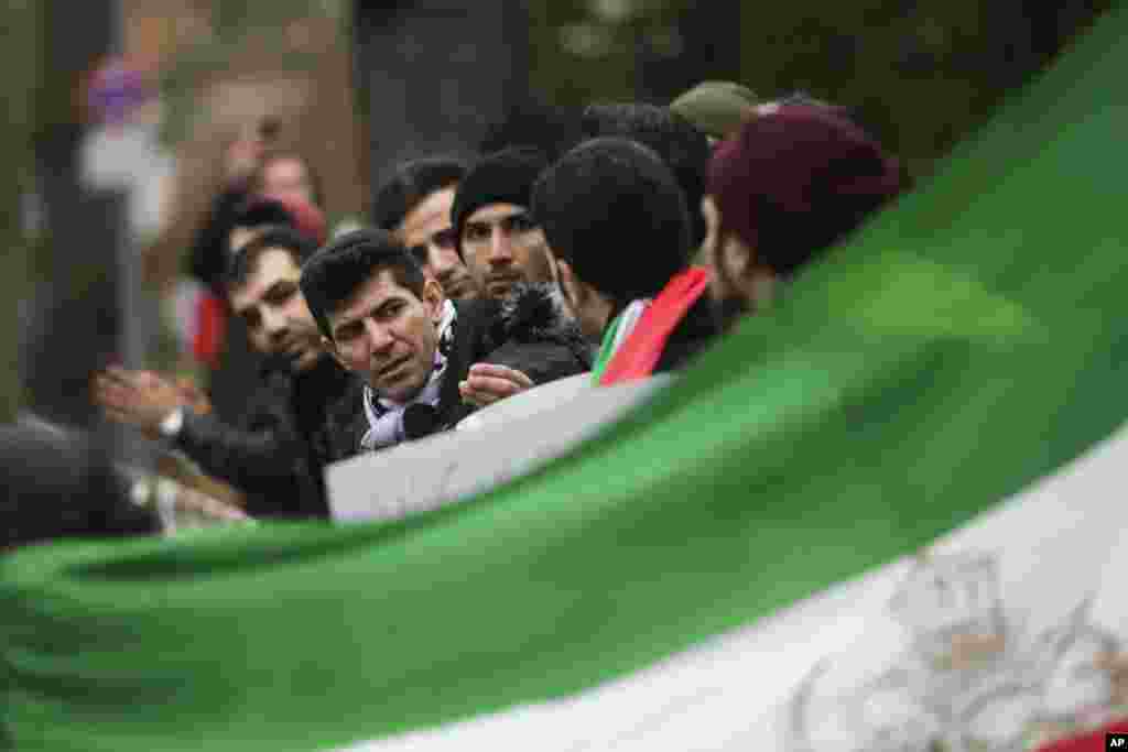 Demonstrators protest against the current government in Iran near the Iranian embassy in Berlin, Germany, Jan. 2, 2018.