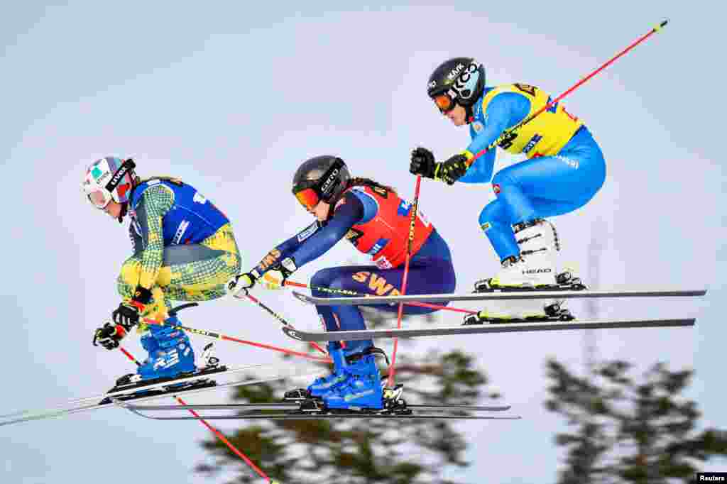 Germany&#39;s Daniela Maier, Sweden&#39;s Alesandra Edemo and Italy&#39;s Jole Galli compete during the women&#39;s semi final of the FIS Freestyle Ski Cross World Cup in Idre, Sweden, Jan. 23, 2022.