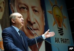 FILE - Turkey's President Recep Tayyip Erdogan addresses the members of his ruling party in Ankara, Turkey, Oct. 13, 2017.