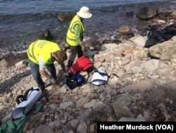 Because there are so few new arrivals and most bypass humanitarian organizations, volunteers poised to help people clean up shores littered with boats and life jackets in Lesbos, Greece, April 3, 2016.