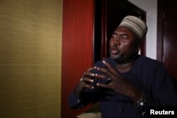 Lawyer Zannah Mustapha, mediator for Chibok girls, speaks during an interview with Reuters in Abuja, Nigeria, May 8, 2017.