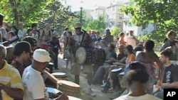 About 150 drummers from all walks of life gather each Sunday in a Washington, DC park for an impromptu musical get-together.