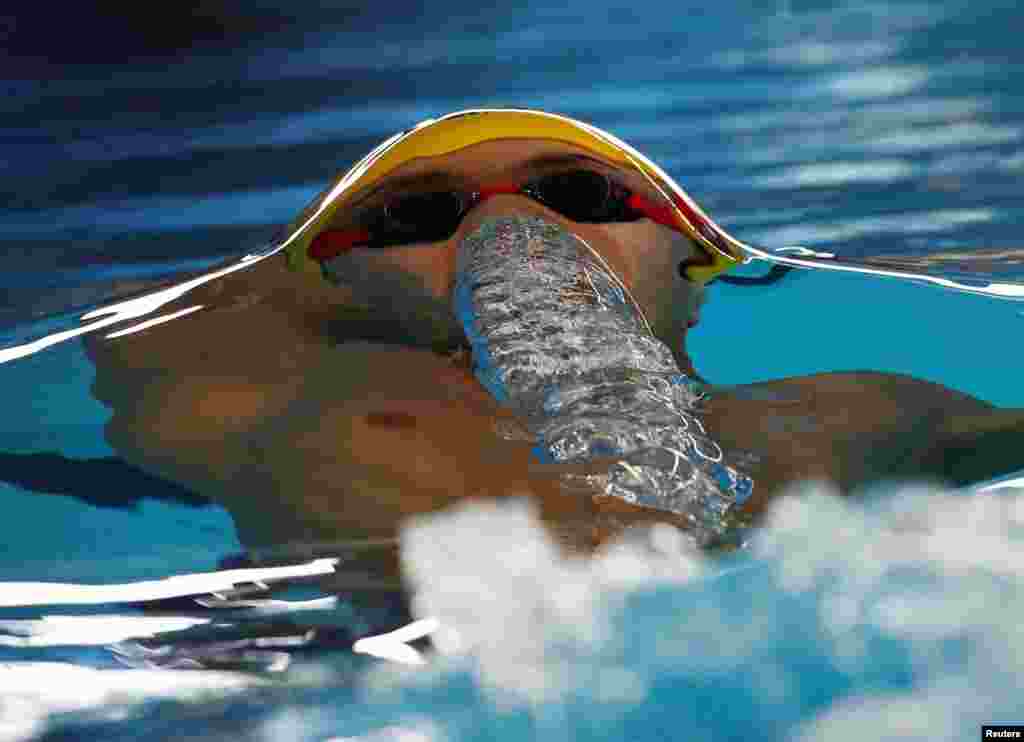 Xu Jiayu of China competes in the men&#39;s 50m backstroke heats swimming event during the 2018 Asian Games in Jakarta, Indonesia.