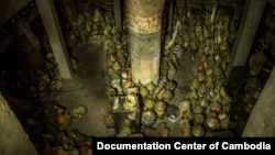 Over 100 cremation urns are seen in this public vault at Wat Lanka in Cambodia’s capital Phnom Penh, Sunday, February 1, 2015. The urns are believed to have been left from Cambodia’s chaotic war period of the 1970s and have yet to be picked up by surviving loved ones. The monks have made public the vault of urns, in hopes of helping people claim them. (Courtesy of Documentation Center of Cambodia)