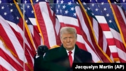 Bivši američki predsjednik Donald Trump tokom obraćanja na skupu koji je prethodio nasilnom upadu u Kapitol (AP/Jacquelyn Martin)
