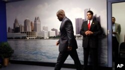 State-appointed emergency manager Kevyn Orr enters a news conference in Detroit July 18, 2013.