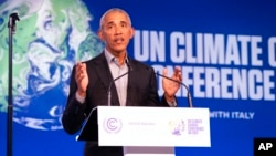 Former U.S. President Barack Obama gestures as he speaks during the COP26 U.N. Climate Summit in Glasgow, Scotland, Nov. 8, 2021.