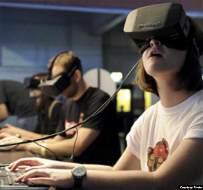 Students use virtual reality for an immersive educational experience. VR blocks out the physical world and transports the user to a simulated world. (Courtesy Dell.com)