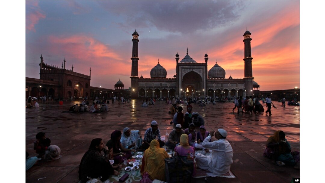 FILE - Indian Muslims break their Ramadan fast in New Delhi, India. There is strong opposition to reform of the divorce law from clerics and influential Muslim organizations.