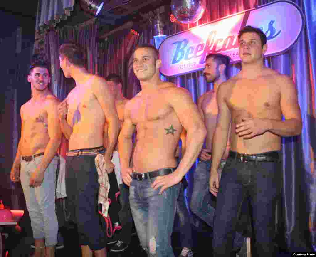 &ldquo;I&rsquo;d say seven out of ten clients now are women,&rdquo; said one of the Beefcakes boys introduced onstage. The club serves Pink Tea cocktails and Greek God hamburgers in a venue modeled after a 1950s Miami burger bar. (Photo by Darren Taylor)