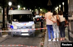 Police secures the area after seven people were wounded in knife attack in downtown Paris, Sept. 10, 2018.