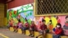 Students from the Sovannaphumi school wearing face masks maintain social distancing as Cambodia reopen schools and museums after months of shutdown due to surging of the coronavirus disease (COVID-19) in Phnom Penh, Cambodia, January 4, 2021. (REUTERS)