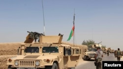 阿富汗安全部隊在赫爾曼德省的納丁阿里地區 (資料圖片）