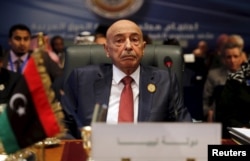 FILE - President of the Libyan House of Representatives Aguila Saleh attends the closing session of an Arab summit in Sharm el-Sheikh, in the South Sinai governorate, south of Cairo, March 29, 2015.