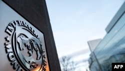 FILE - The seal for the International Monetary Fund is seen in Washington, Jan. 10, 2022.