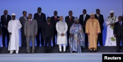 FILE - India's Prime Minister Narendra Modi (C) poses with his counterparts from African countries during the Inaugural Session of the India-Africa Forum Summit in New Delhi, India.