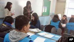 Students at the Seoul Dasom High School for Multicultural Children take Korean as a second language class, March 2012.
