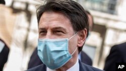 Italian Premier Giuseppe Conte leaves after addressing the Senate, in Rome, Thursday, April 30, 2020. I