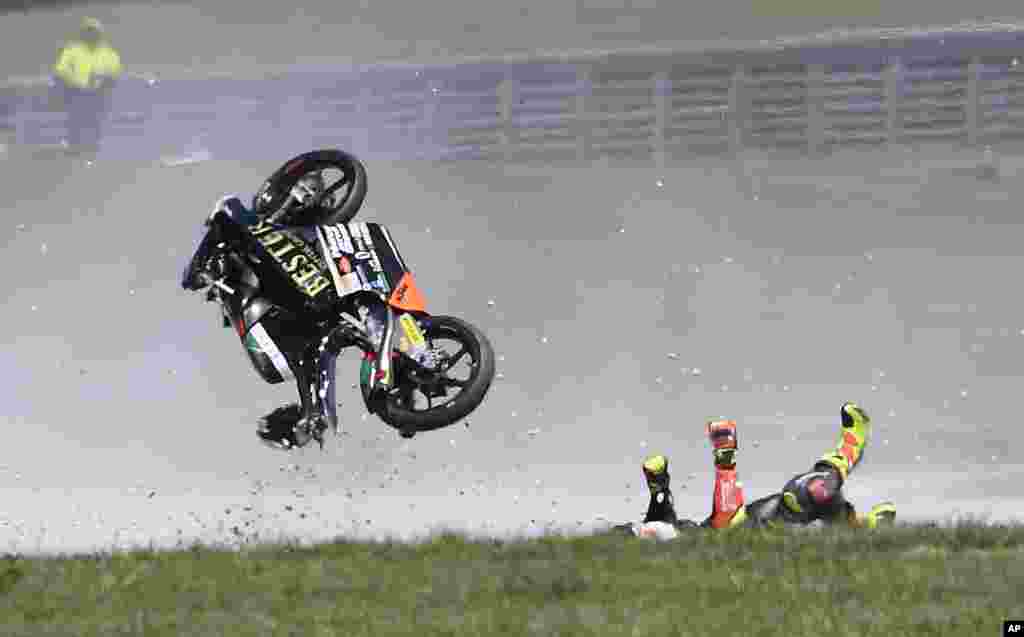 Bester Capital Dubai rider Marcos Ramirez of Spain crashes during the Moto3 race Australian Motorcycle Grand Prix at Phillip Island.