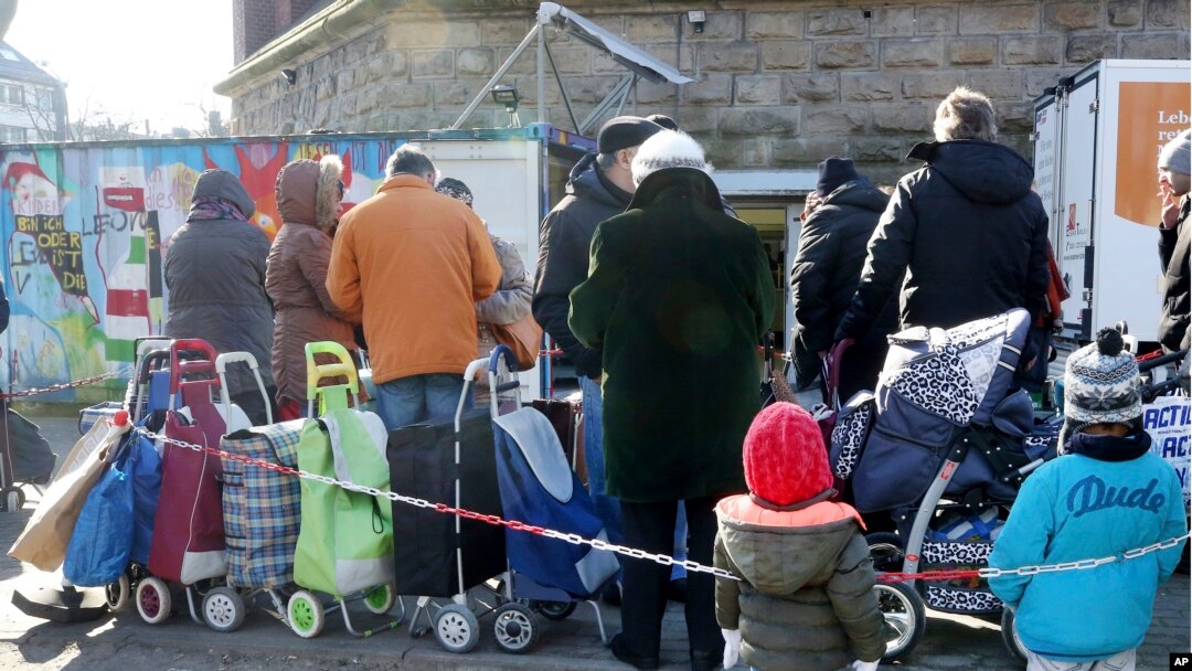 Migranti u redu za hranu u Nemačkoj