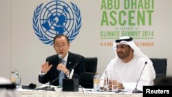 U.N. Secretary General Ban Ki-moon (L) and United Arab Emirates (UAE) Minister of State Sultan Ahmed Al Jaber attend a news conference on climate change in Abu Dhabi, May 4, 2014.