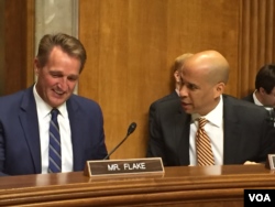 Senators Jeff Flake and Cory Booker