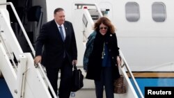 U.S. Secretary of State Mike Pompeo and his wife Susan arrive at Ciampino military airport for an official visit to Italy, October 1, 2019. REUTERS/Yara Nardi 