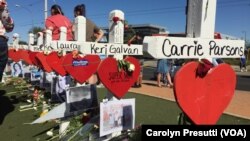 The crosses, erected in a graceful, curvy line behind the “Welcome to Las Vegas” sign, serve as markers of the lives of those who died when a gunman opened fire Oct. 1, 2017, at the crowd attending a country music concert in Las Vegas. Many visitors leave behind flowers or tokens as memories. 