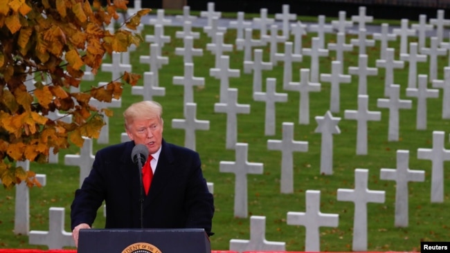 U.S. President Donald Trump speaks as he takes part in the commemoration ceremony for Armistice Day, 100 years after the end of World War One, at the Suresnes American Cemetery and Memorial in Paris, Nov. 11, 2018.