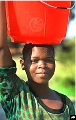 Women in urban areas carry water across long distances