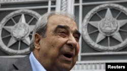 Prominent Syrian opposition activist Michel Kilo talks to the media after a meeting with Russia's Foreign Minister Sergei Lavrov in front of the Foreign Ministry headquarters in Moscow, July 9, 2012. 