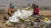 Clothing and personal effects from passengers are seen near the wreckage at the scene of the Ethiopian Airlines Flight ET 302 plane crash, near the town of Bishoftu, southeast of Addis Ababa, March 11, 2019. 