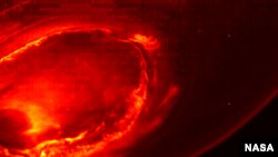 Jovian Infrared Auroral Mapper atau JIRAM di balik awan Yupiter (foto: NASA).