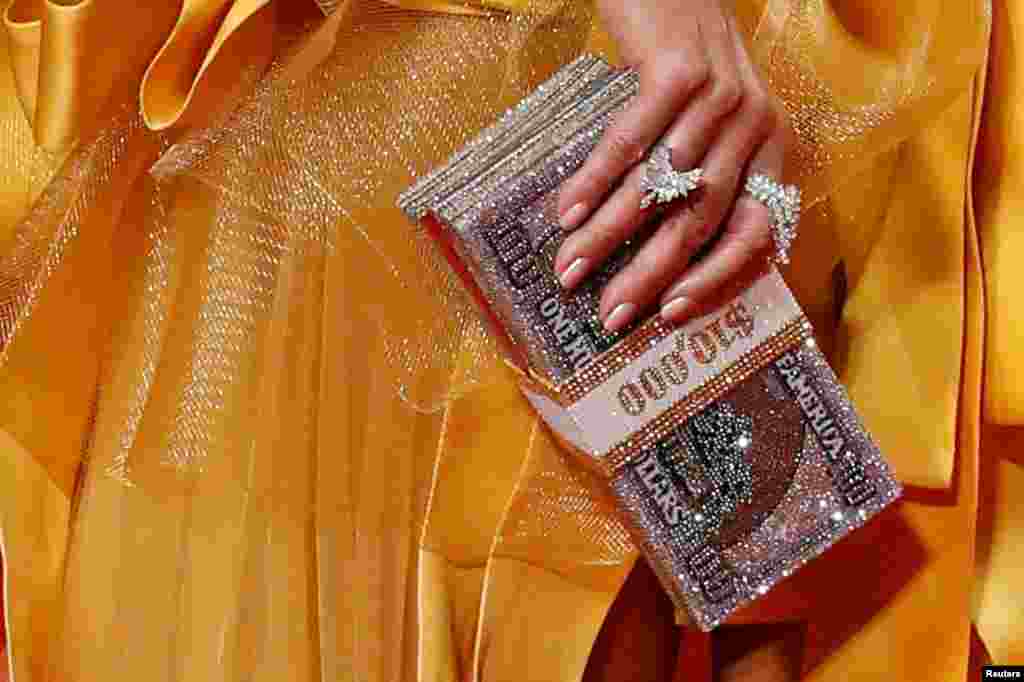 The purse of cast member Jennifer Lopez is seen as she arrives for the gala presentation of Hustlers at the Toronto International Film Festival (TIFF) in Toronto, Ontario, Canada, Sept. 7, 2019.