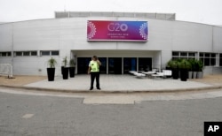A security guard stands outside the G20 summit venue at the Costa Salguero Center, Buenos Aires, Argentina, Nov. 27, 2018.