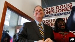 Democratic senatorial candidate Doug Jones speaks during a campaign rally Sunday, Dec. 10, 2017, in Birmingham, Alabama.