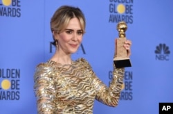 Sarah Paulson poses in the press room with the award for best performance by an actress in a limited series or a motion picture made for television for "The People v. O.J. Simpson: American Crime Story" at the 74th annual Golden Globe Awards at the Beverly Hilton Hotel on Sunday, Jan. 8, 2017, in Beverly Hills, Calif.