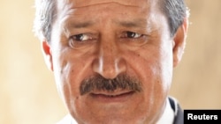 Nawaf Fares, Syria's Ambassador to Iraq, in a picture taken December 7, 2006.