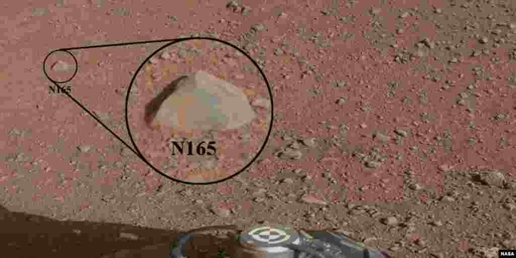 A close-up shows a view of a Martian rock that the NASA rover Curiosity zapped at using its laser instrument.