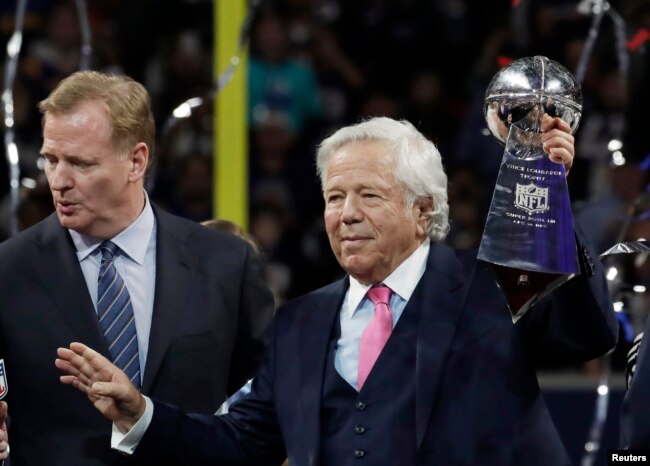 FILE - New England Patriots owner Robert Kraft celebrates with the Vince Lombardi Trophy after winning Super Bowl LIII, Feb. 3, 2019, in Atlanta, Ga.