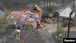 Несколько домов были разрушены в результате торнадо в городе Гувер в штате Алабама, 25 марта 2021 года